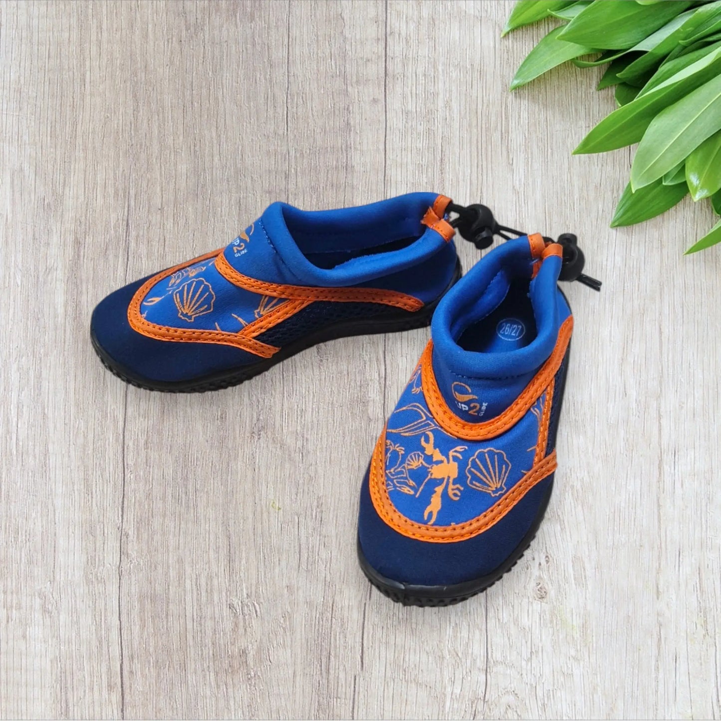 Chaussons de plage garçon Décathlon 26/27 bleu électrique orange semelle caoutchouc