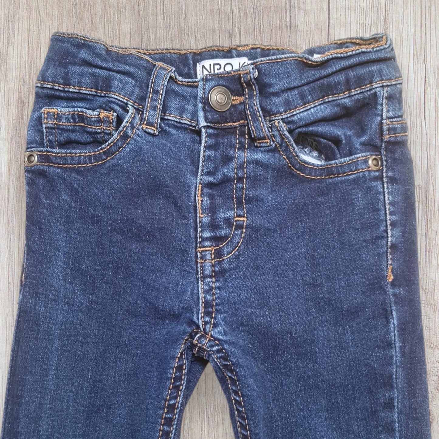 Jean garçon slim bleu brut Districenter en 3 ans