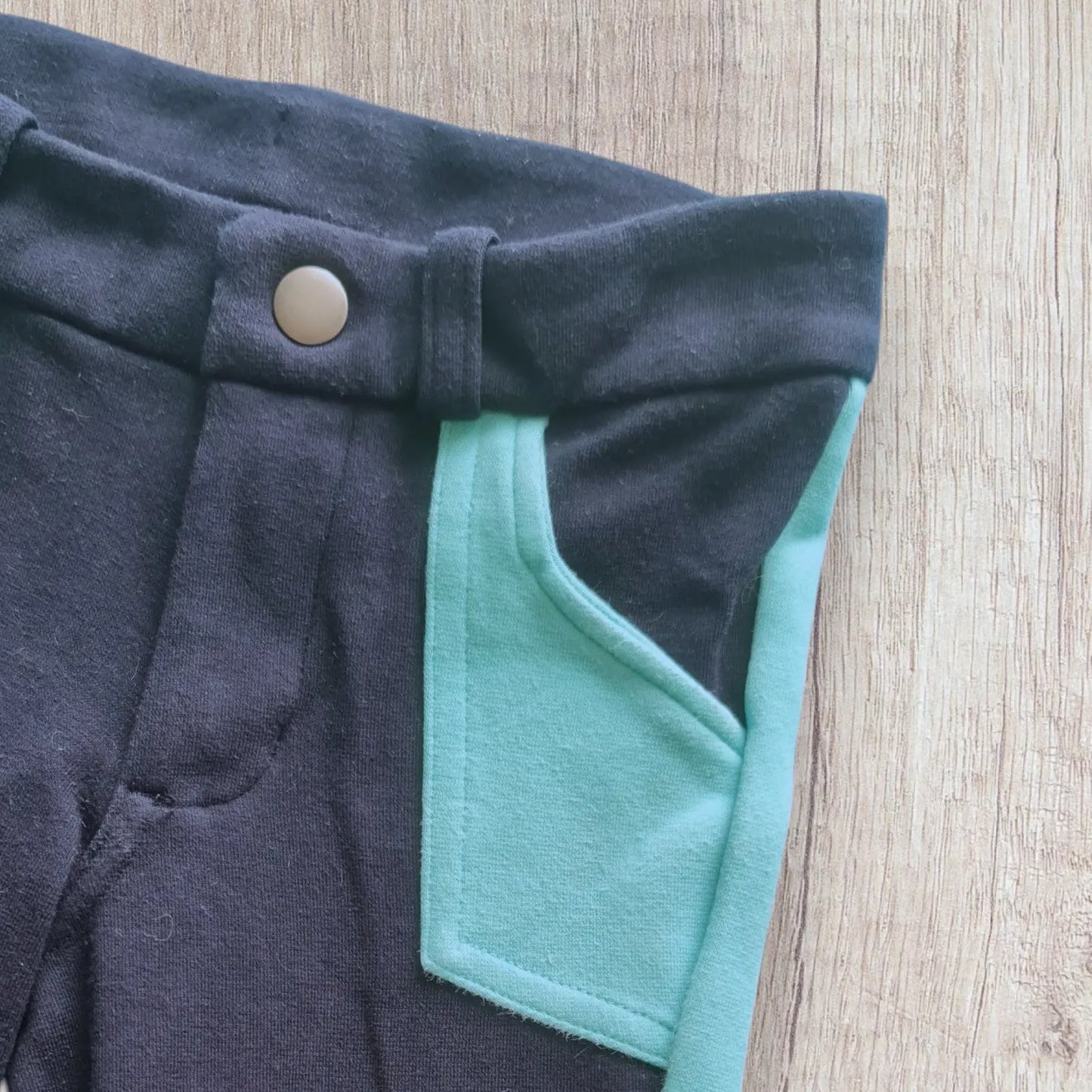 Pantalon équitation enfant Fouganza 5-6 ans bleu marine avec détails turquoise, très bon état