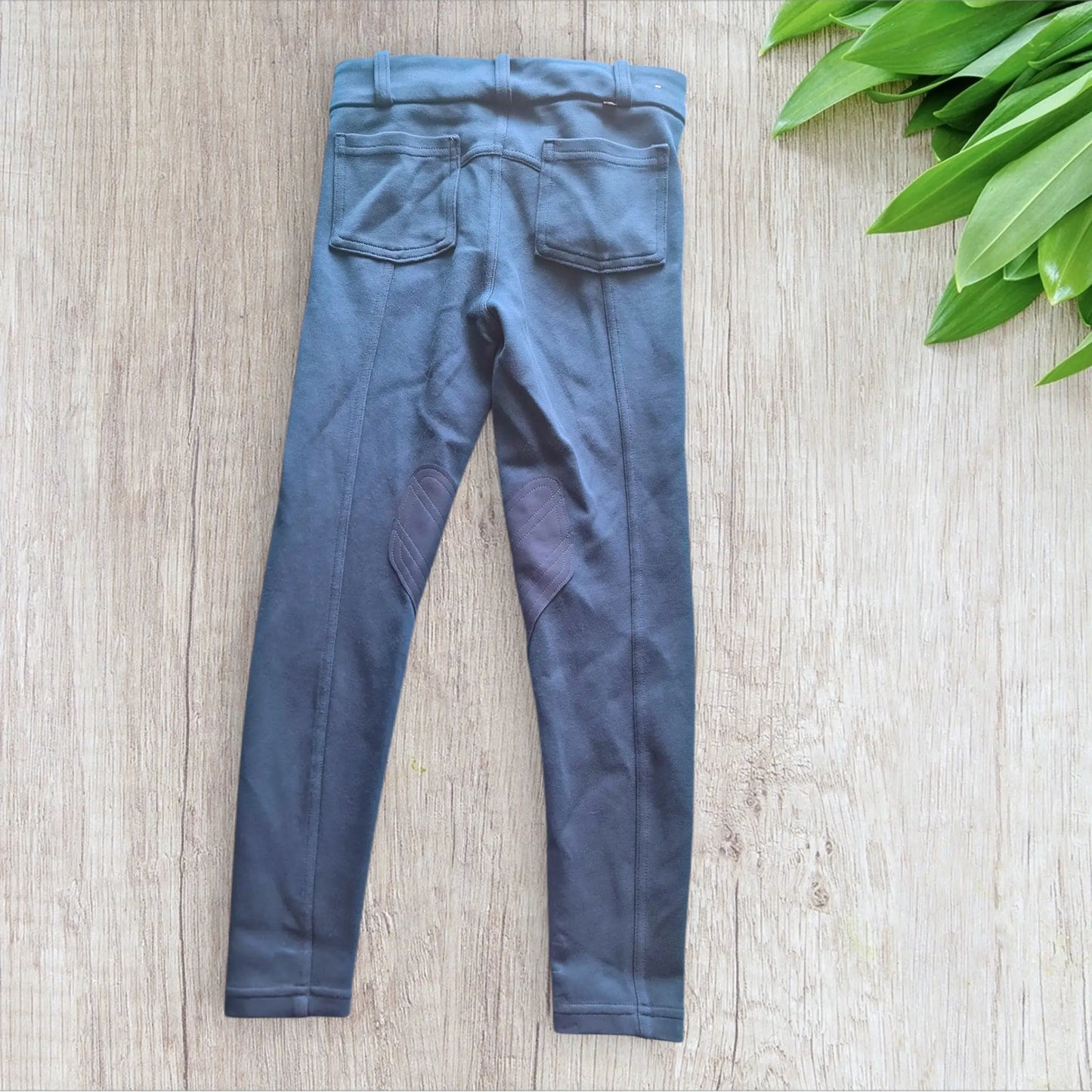Pantalon équitation enfant Fouganza 6 ans bleu pétrole avec basanes aux genoux, très bon état
