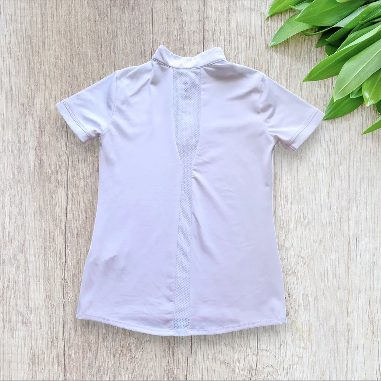 Polo de concours équitation Fouganza 5-6 ans blanc, col zippé, dos mesh, très bon état