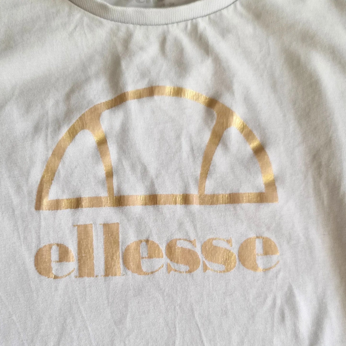 T-shirt fille Ellesse blanc 8 ans avec logo doré, bon état