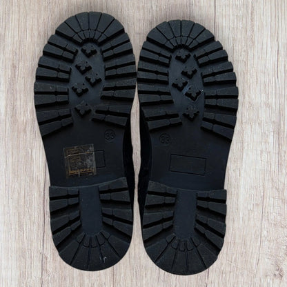 Bottes fille Lovely Skull 33 noires en faux daim montantes jusqu'au genou.