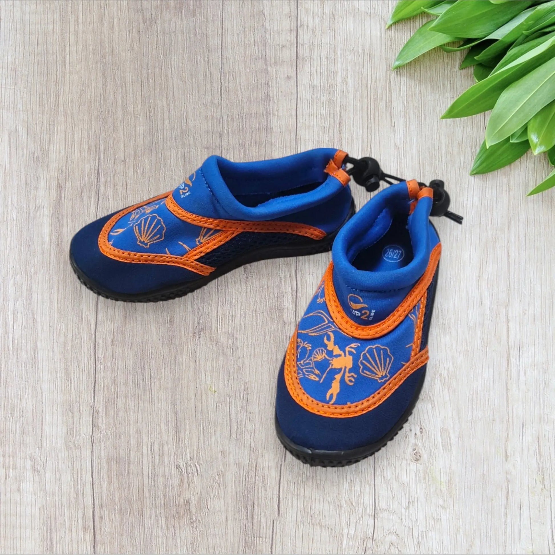 Chaussons de plage garçon Décathlon 26/27 bleu électrique orange semelle caoutchouc