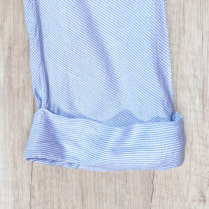 Chemise femme Promod S bleu ciel à fines rayures blanches avec boutons en nacre et manches 3/4.