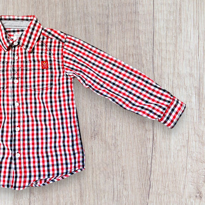 Chemise garçon P’tites Canailles 7 ans à carreaux rouge blanc noir avec broderie et boutons nacrés.