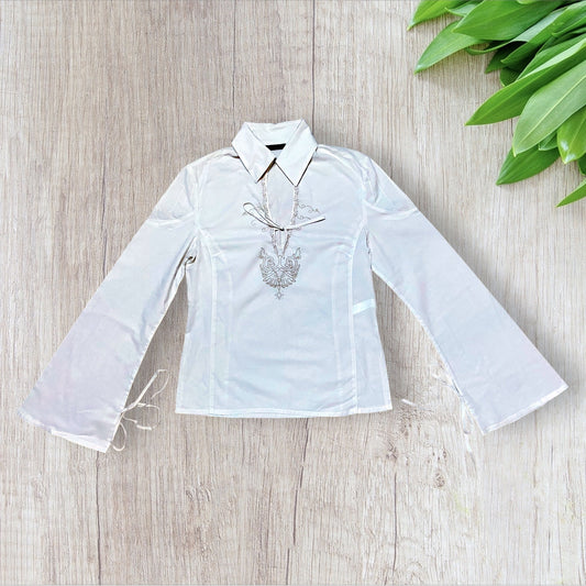 Chemisier femme IKKS blanc taille 38 avec broderies et manches évasées.
