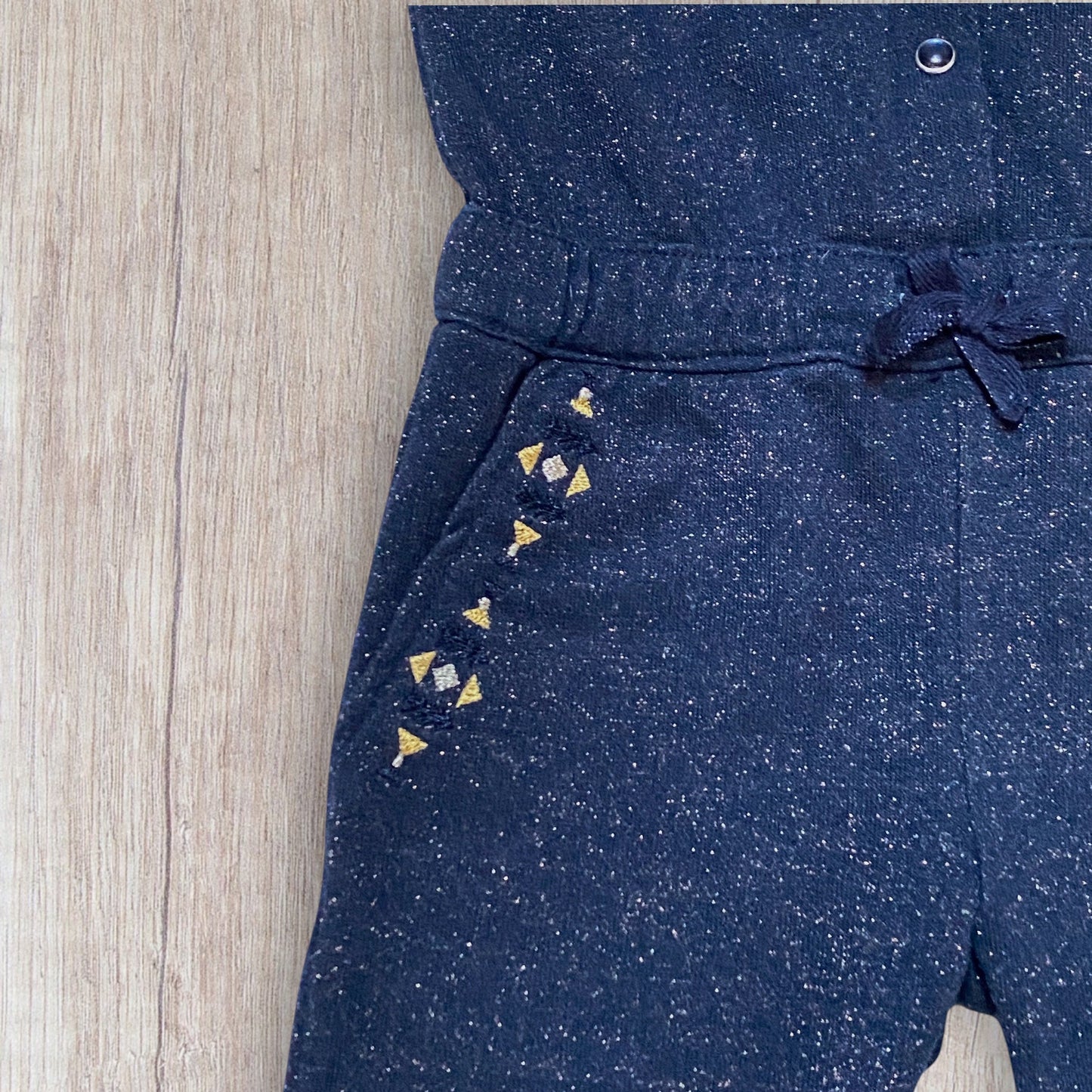 Combinaison bébé fille Orchestra 2 ans bleu marine pailletée en matière jogging.