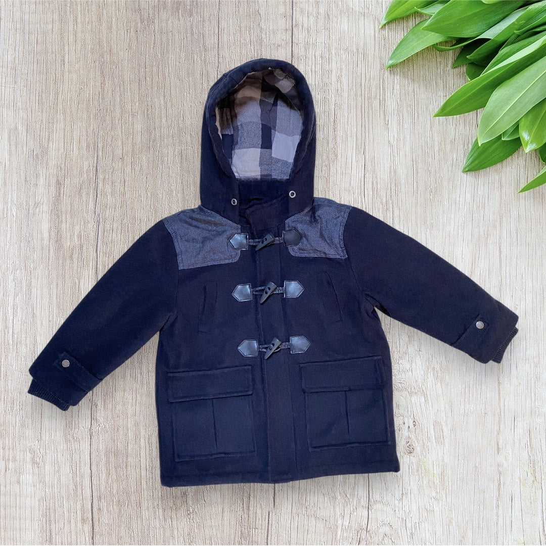 Duffle coat garçon Orchestra 4 ans bleu marine avec capuche et doublure à carreaux.