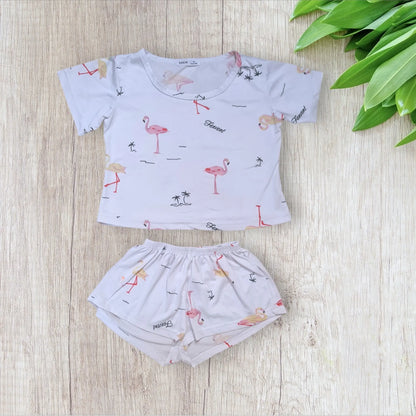 Pyjama fille SHEIN 6 ans – t-shirt et short blanc – flamants roses et palmiers