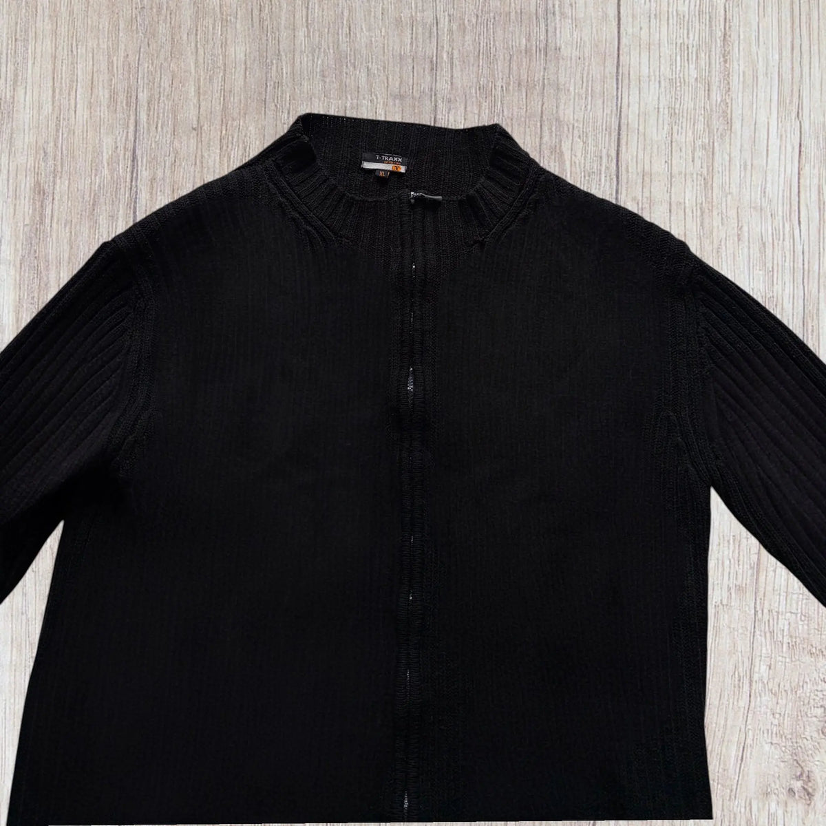 Gilet homme T-Traxx XL noir en maille côtelée avec col montant et double fermeture zippée.