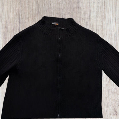 Gilet homme T-Traxx XL noir en maille côtelée avec col montant et double fermeture zippée.