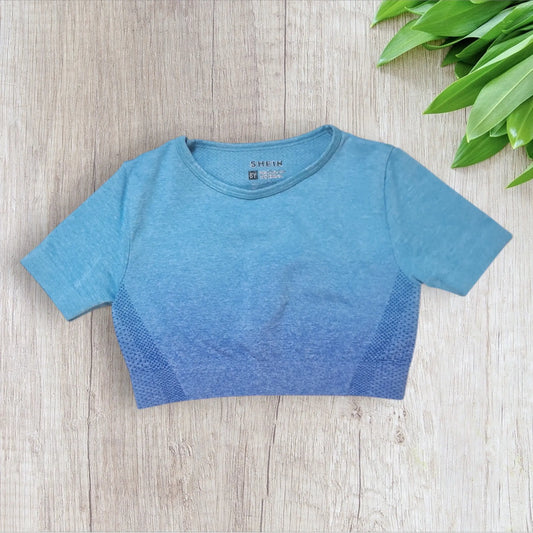 Haut de sport fille Shein bleu dégradé 6 ans très bon état