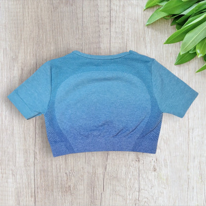 Haut de sport fille Shein bleu dégradé 6 ans très bon état