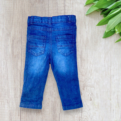 Jean bébé garçon Orchestra 9 mois bleu effet usé avec broderies fusée et étoiles.