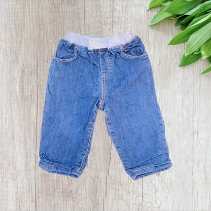 Jean doublé bébé Bout’chou 9 mois bleu jean mixte avec intérieur jogging gris et taille élastique.