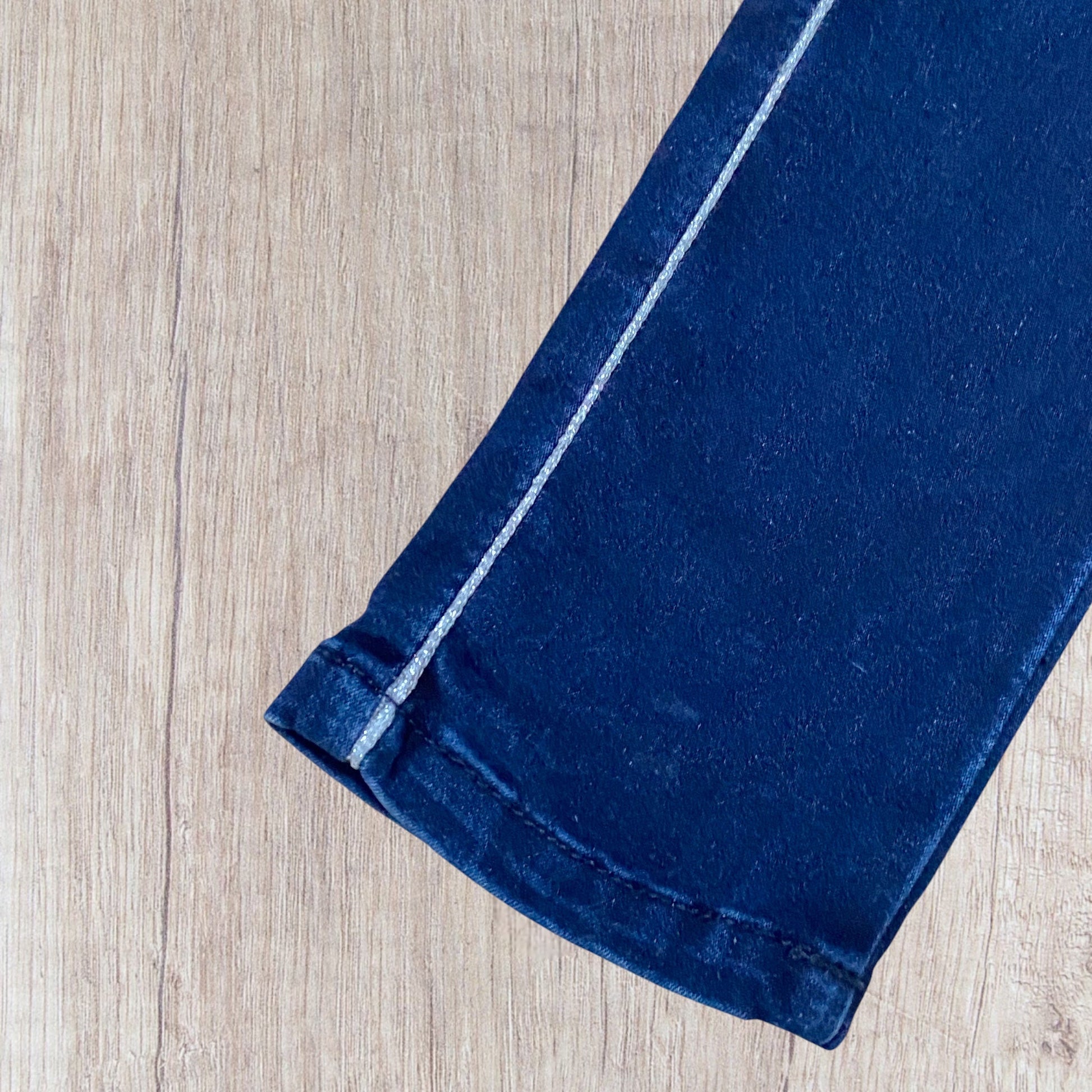 Jean fille 6 ans slim foncé avec liseré argenté et effet décoloré aux genoux