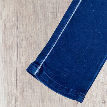 Jean fille 6 ans slim foncé avec liseré argenté et effet décoloré aux genoux