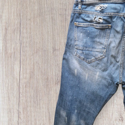 Jean homme Zara bleu denim effet destroy, taille 44, très bon état