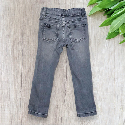 Jean slim garçon 3 ans NPO gris en très bon état.