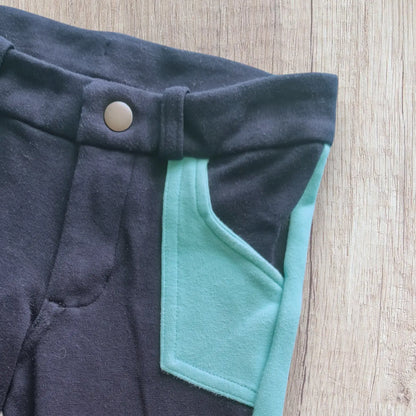 Pantalon équitation enfant Fouganza 5-6 ans bleu marine avec détails turquoise, très bon état