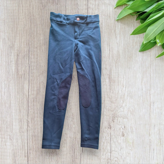 Pantalon équitation enfant Fouganza 6 ans bleu pétrole avec basanes aux genoux, très bon état
