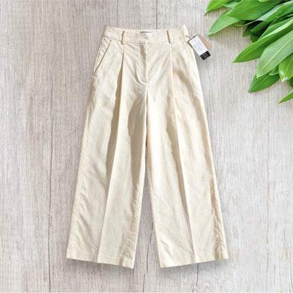 Pantalon femme Kiabi taille 40 crème à coupe droite.