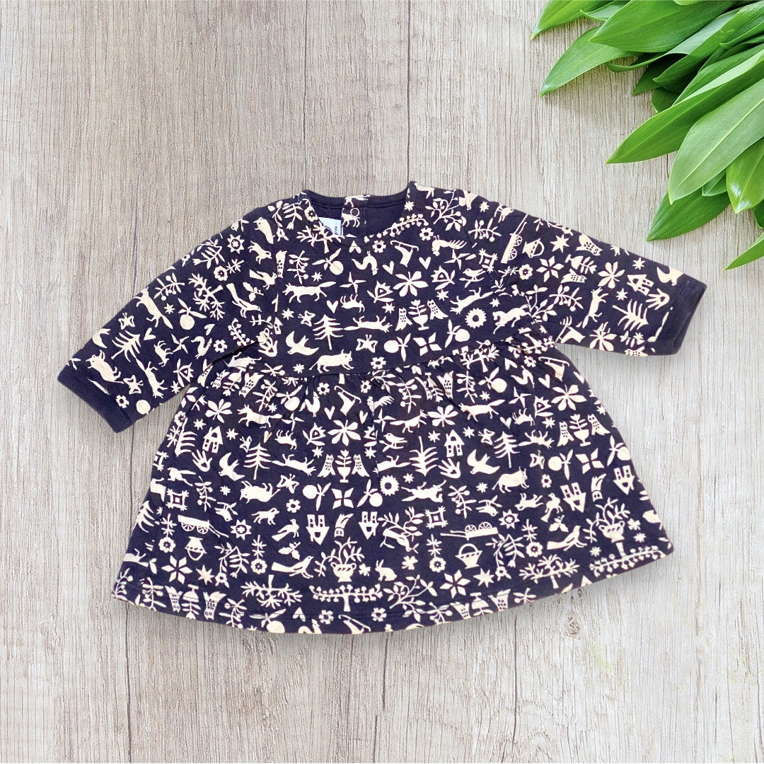 Robe bébé Petit Bateau 6 mois bleu marine imprimé beige à manches longues.