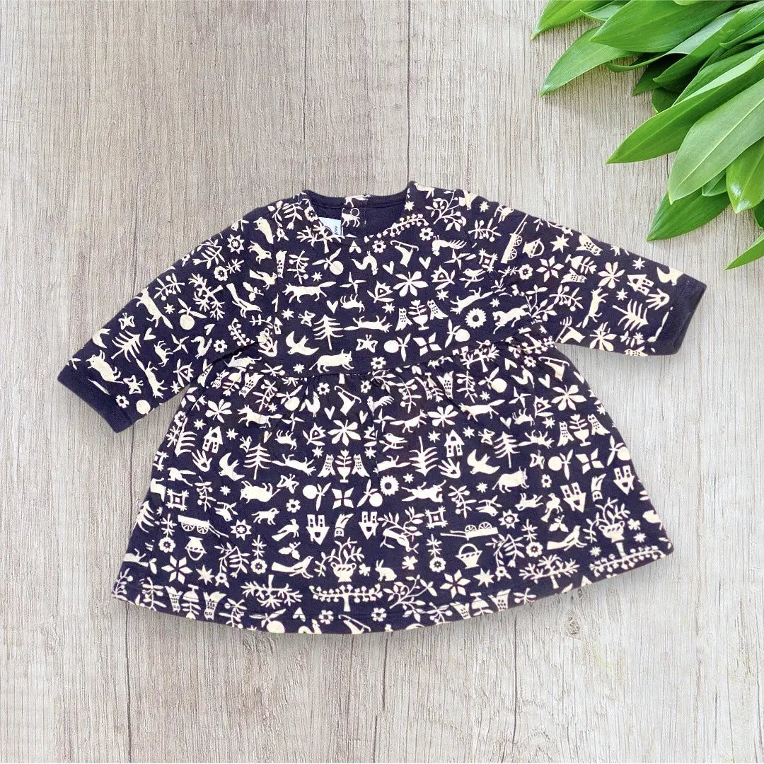 Robe bébé Petit Bateau 6 mois bleu marine imprimé beige à manches longues.