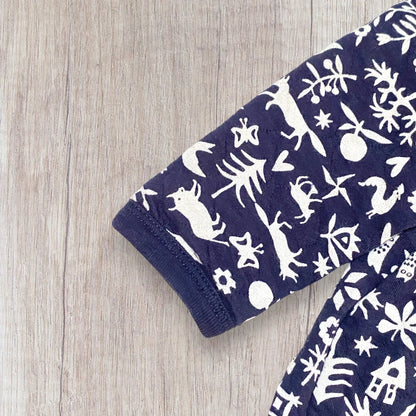 Robe bébé Petit Bateau 6 mois bleu marine imprimé beige à manches longues.