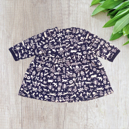 Robe bébé Petit Bateau 6 mois bleu marine imprimé beige à manches longues.