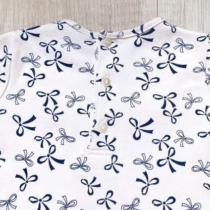 Robe bébé fille 12 mois beige imprimé nœuds bleu marine col volanté.