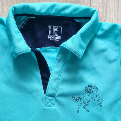T-shirt équitation enfant Fouganza 6 ans turquoise et bleu marine, très bon état