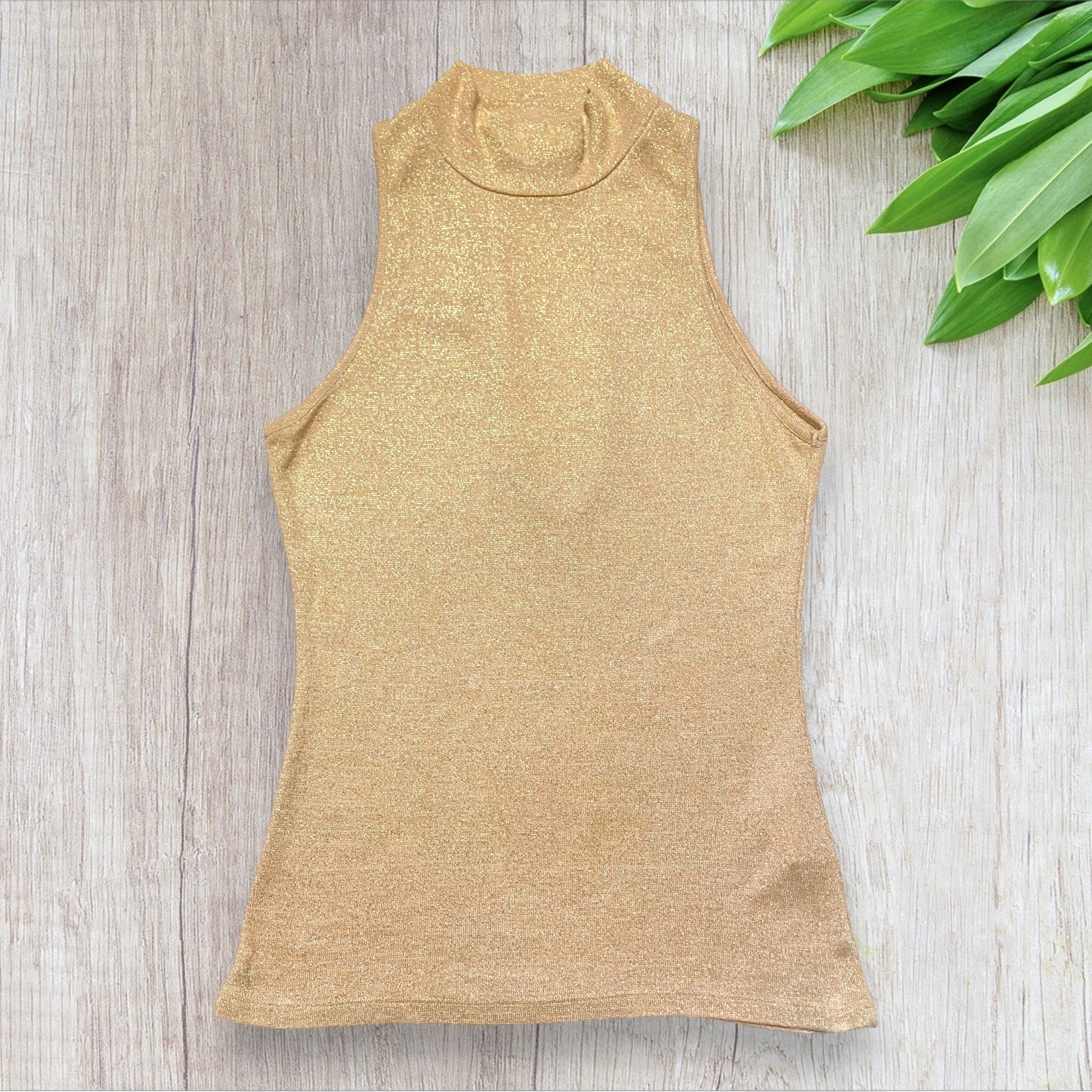 Top femme Morgan doré pailleté taille S sans manche et dos nu.