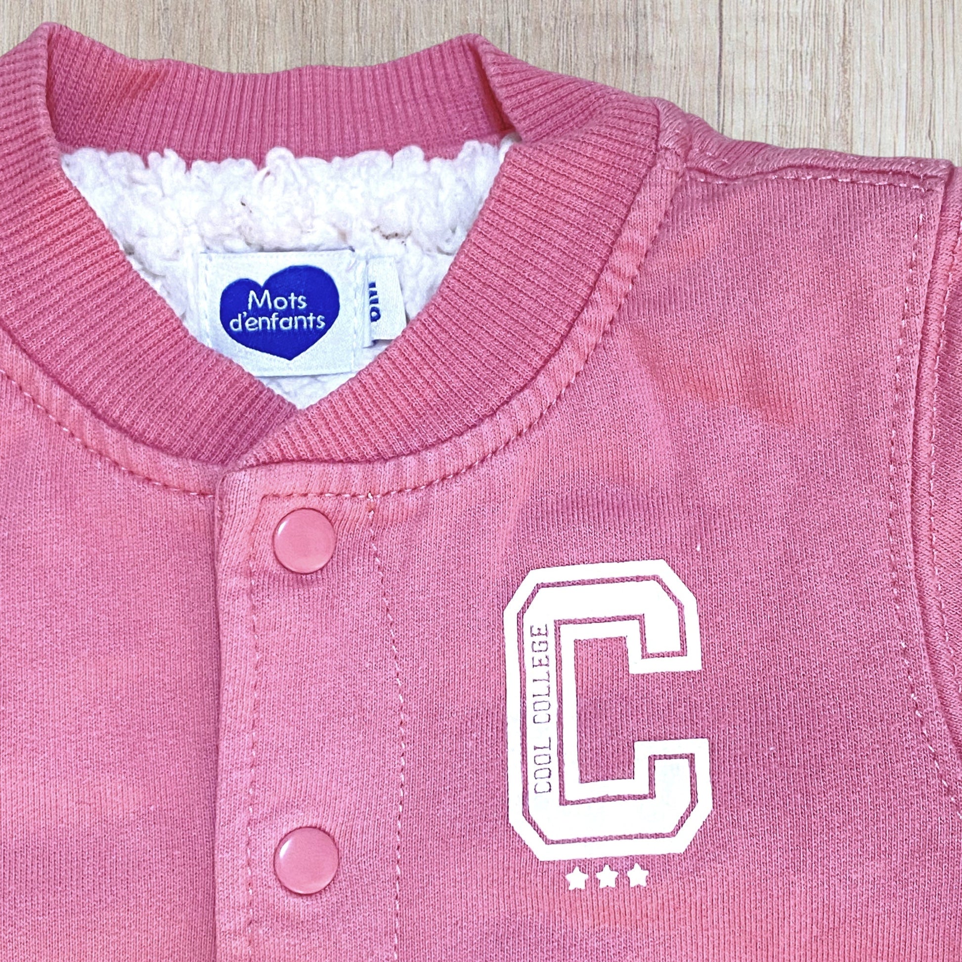 Veste bébé fille Mot d’Enfant 6 mois rose et blanche doublée polaire.
