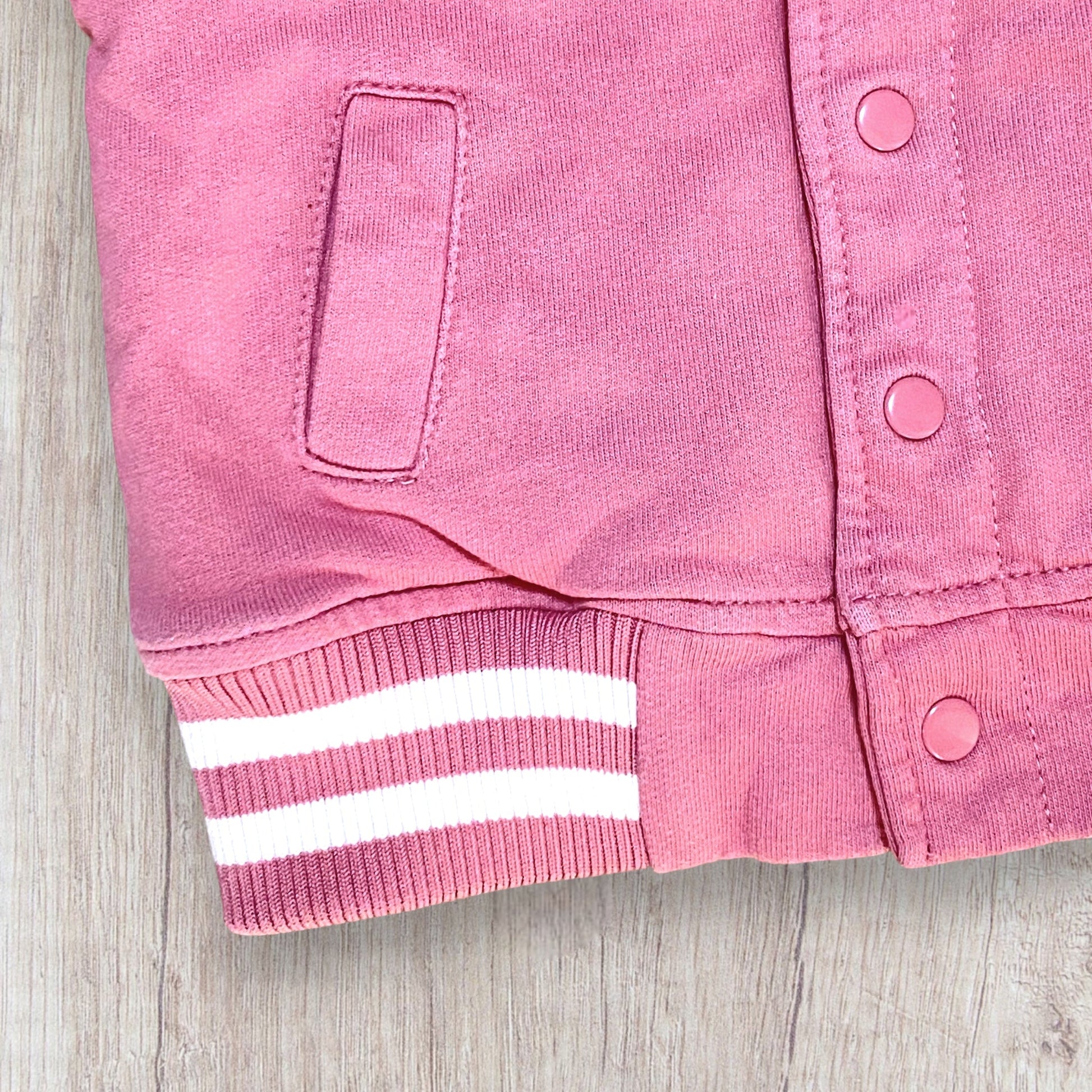 Veste bébé fille Mot d’Enfant 6 mois rose et blanche doublée polaire.