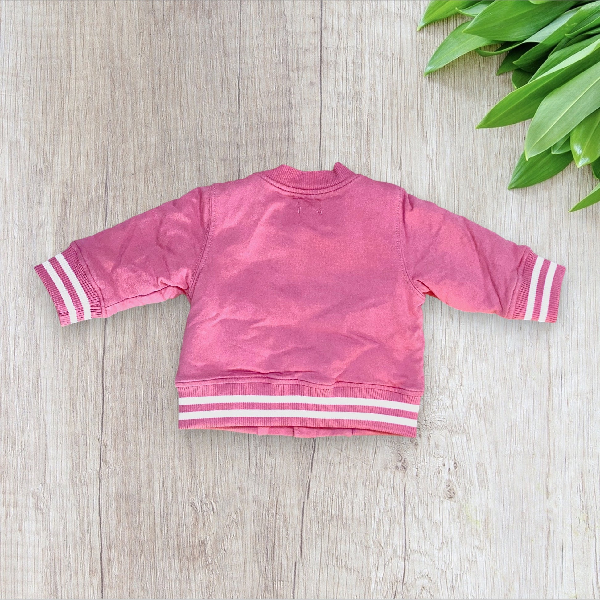 Veste bébé fille Mot d’Enfant 6 mois rose et blanche doublée polaire.