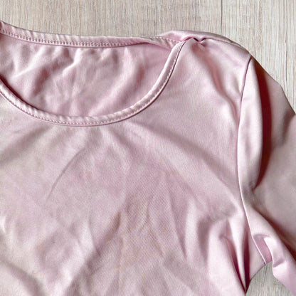 Ensemble fille Shein 8 ans composé d'un haut rose pâle à manches longues et d'une jupe terracotta effet velours côtelé à cœurs noirs.